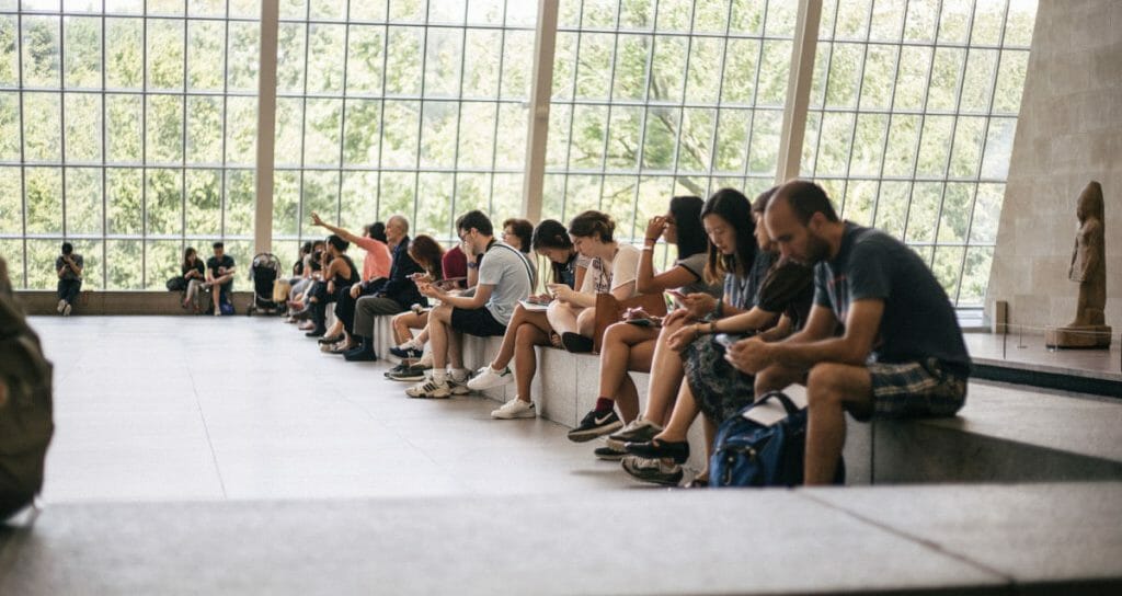 Power of the News while people are sitting around on their phones