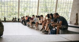 Power of the News while people are sitting around on their phones